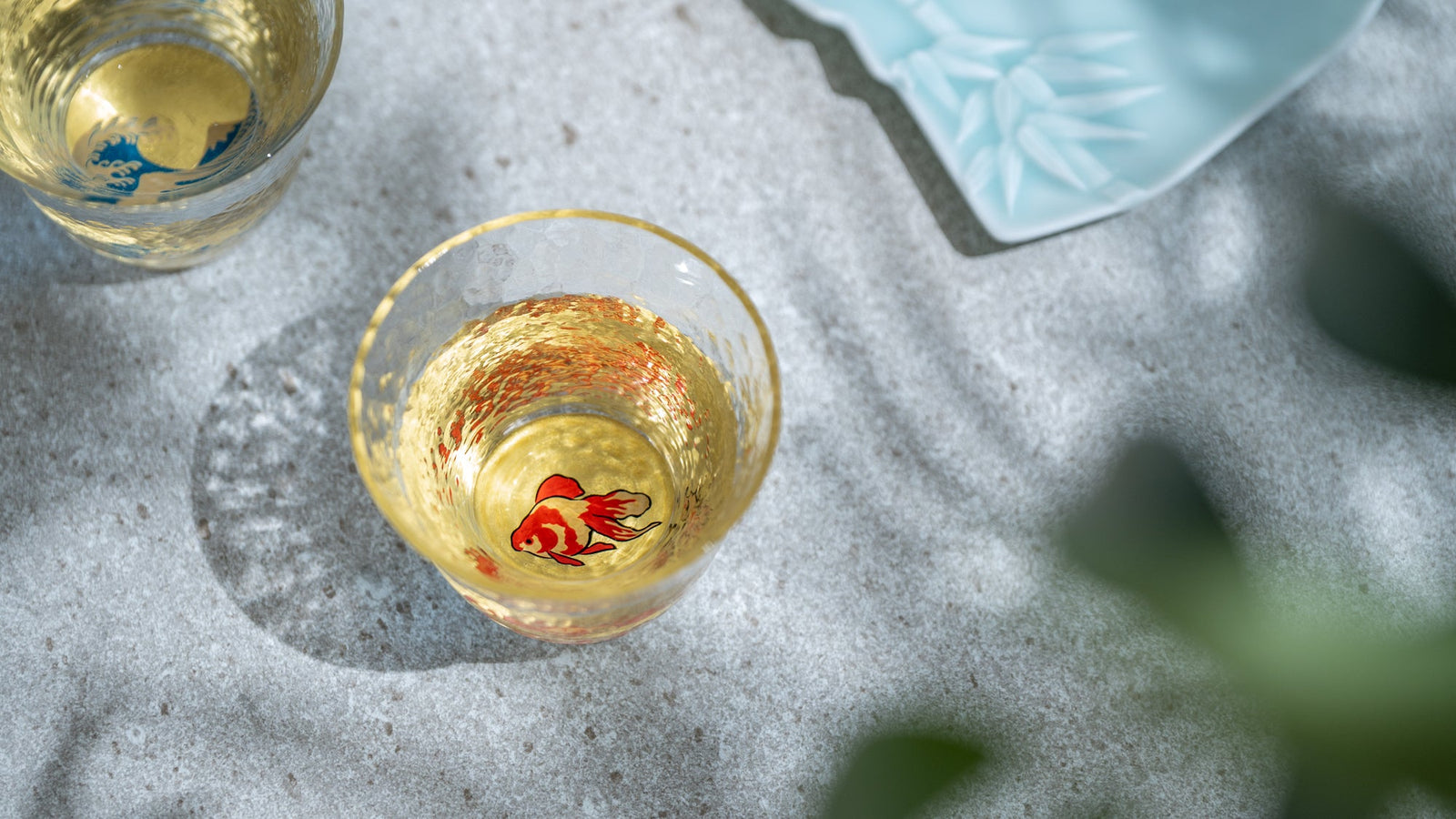 Glass sake cup with beautiful gold maki-e lacquer decoration
