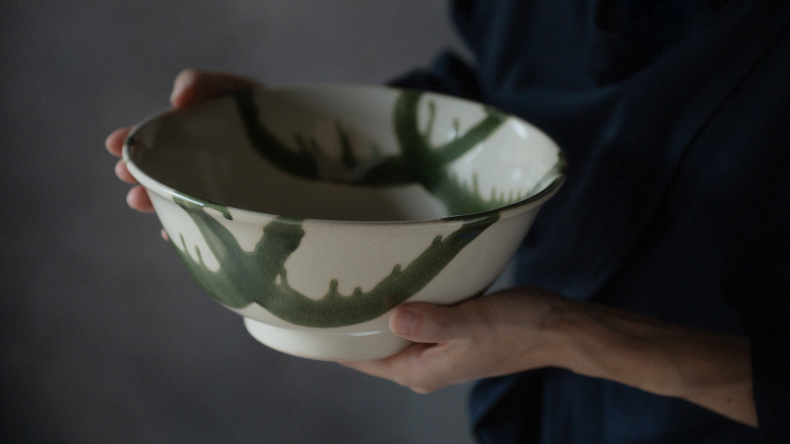 Holding a beautiful ramen bowl