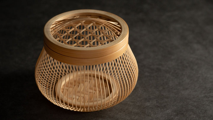 A beautiful Japanese bamboo basket with a woven lattice pattern