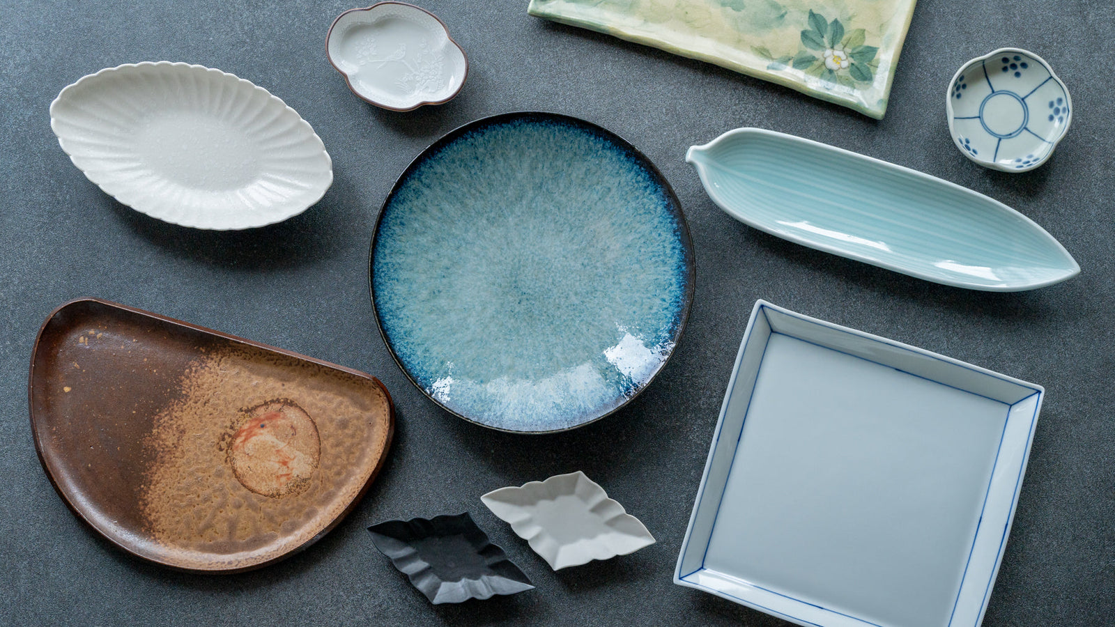 Assorted Japanese plates in a variety of shapes