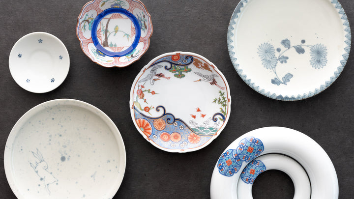 A collection of fine Imari porcelain plates arranged together