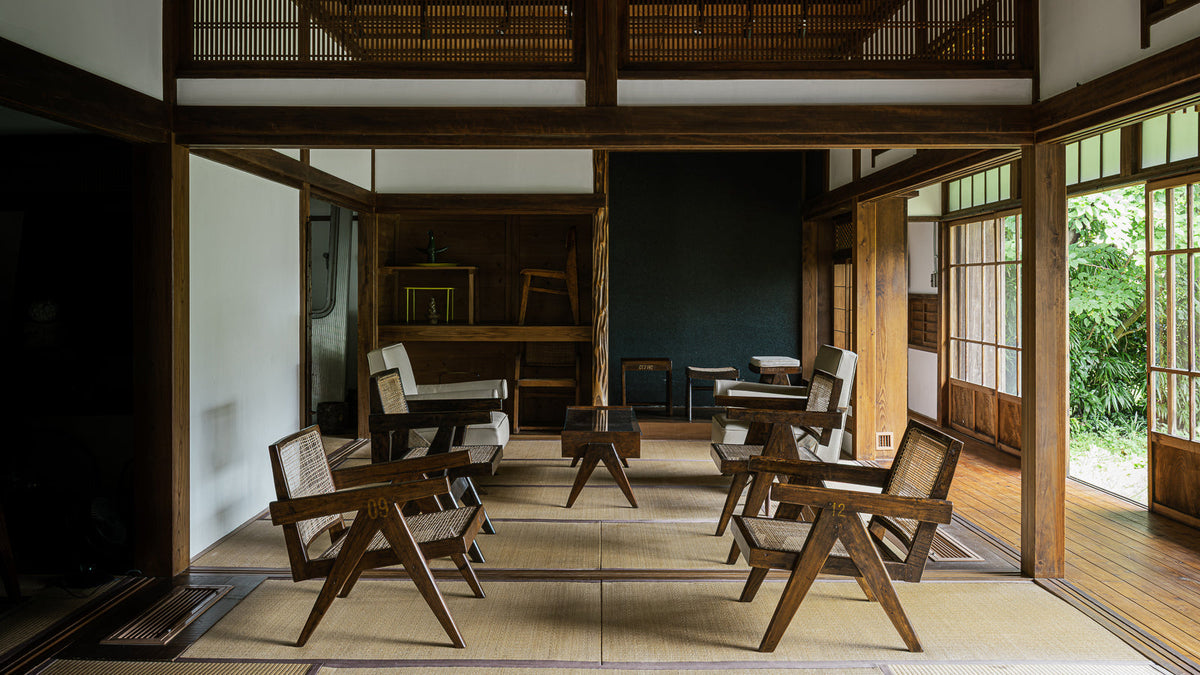 Antique furniture arranged inside a traditional Japanese kominka