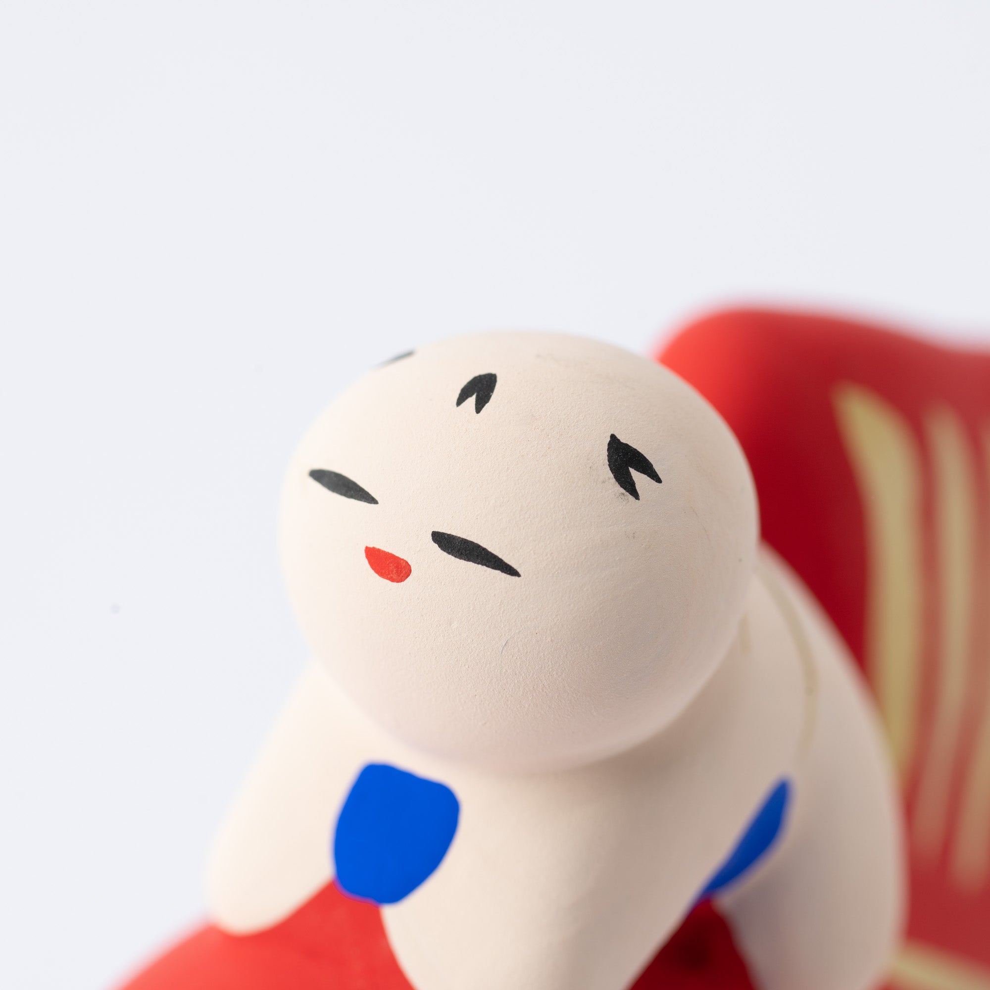 Figura de dorada y niño