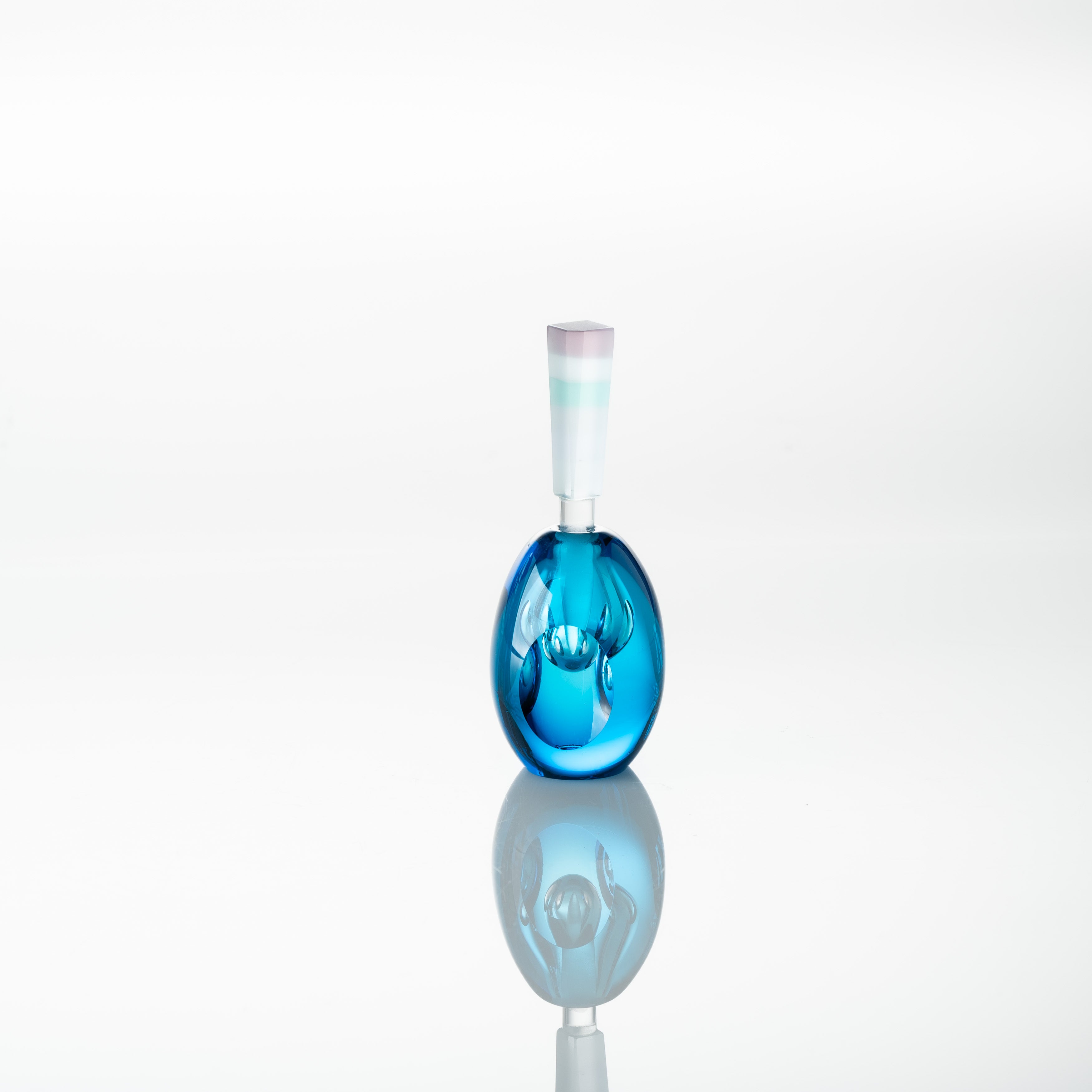 Erinnerungen an die Farben des Ozeans Blau Parfümflasche