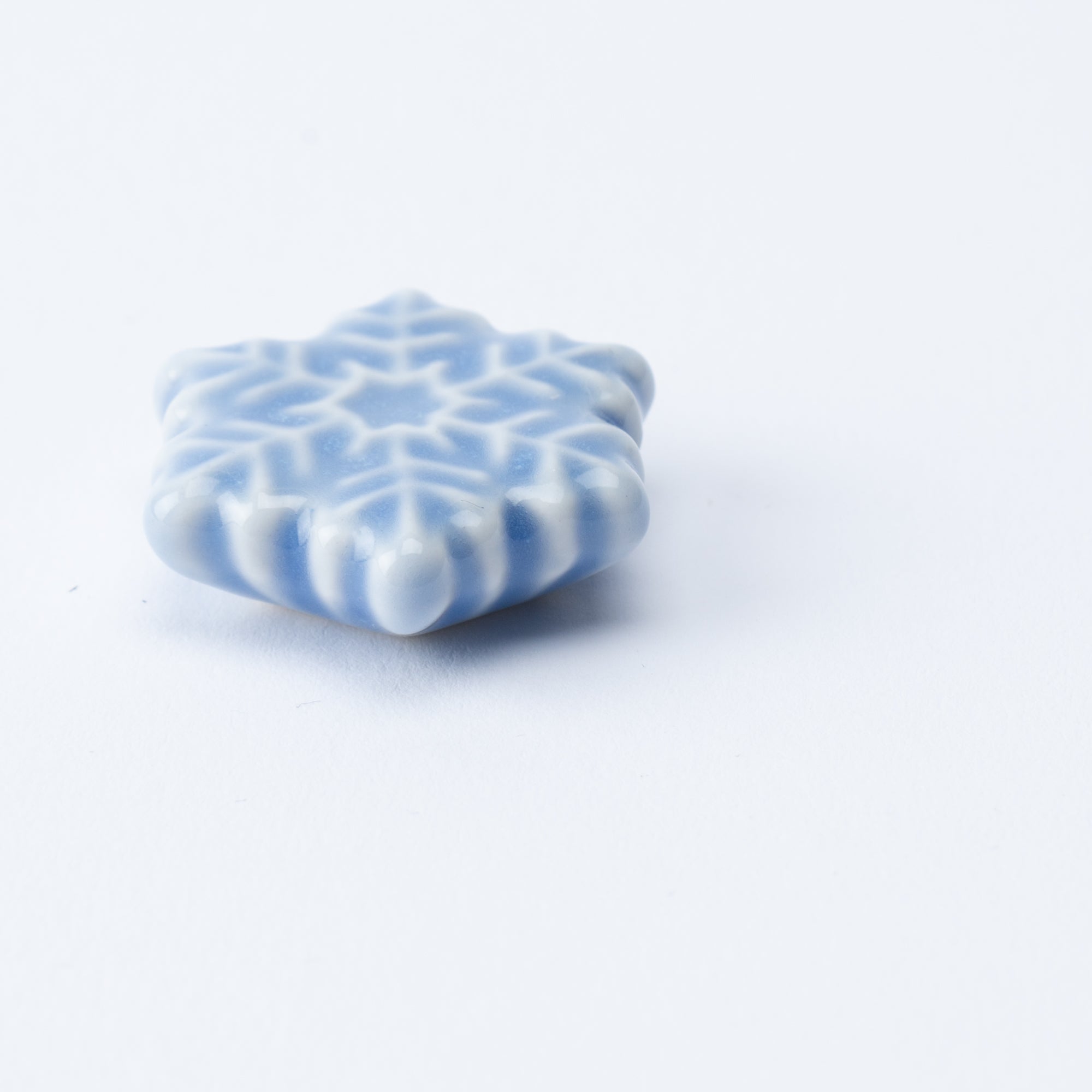 Reposapalillos hexagonal con forma de copo de nieve