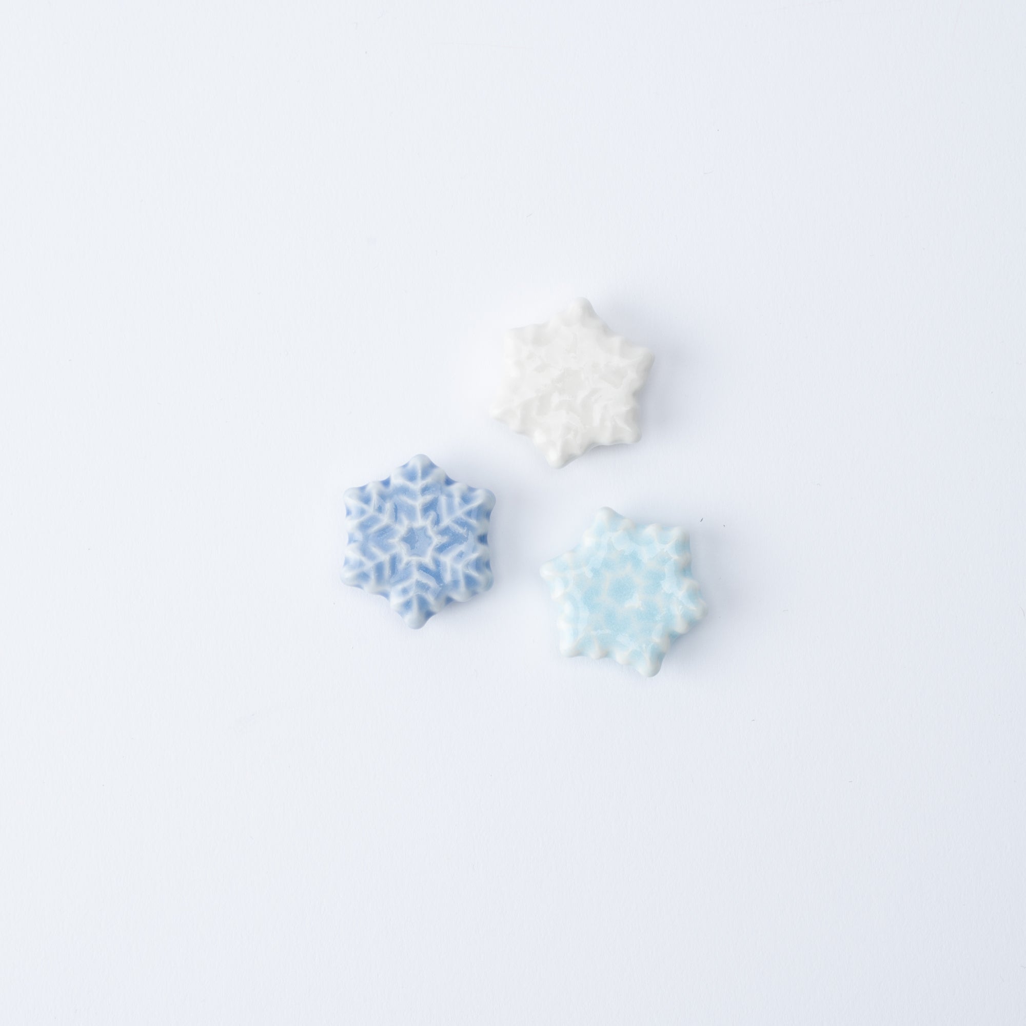 Reposapalillos hexagonal con forma de copo de nieve