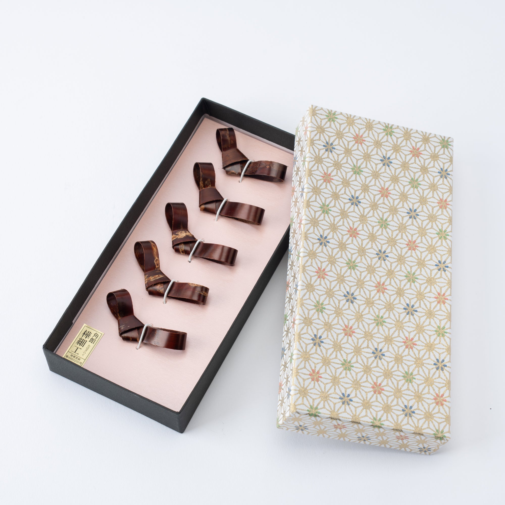 Juego de reposa palillos con diseño de cinta