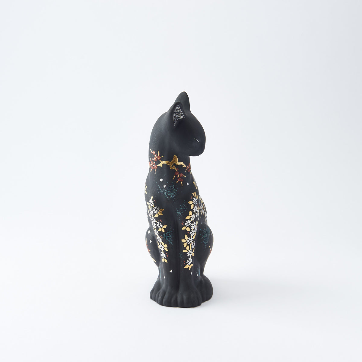 Morikin Aochibu Perserkatzenfigur nach links blickend