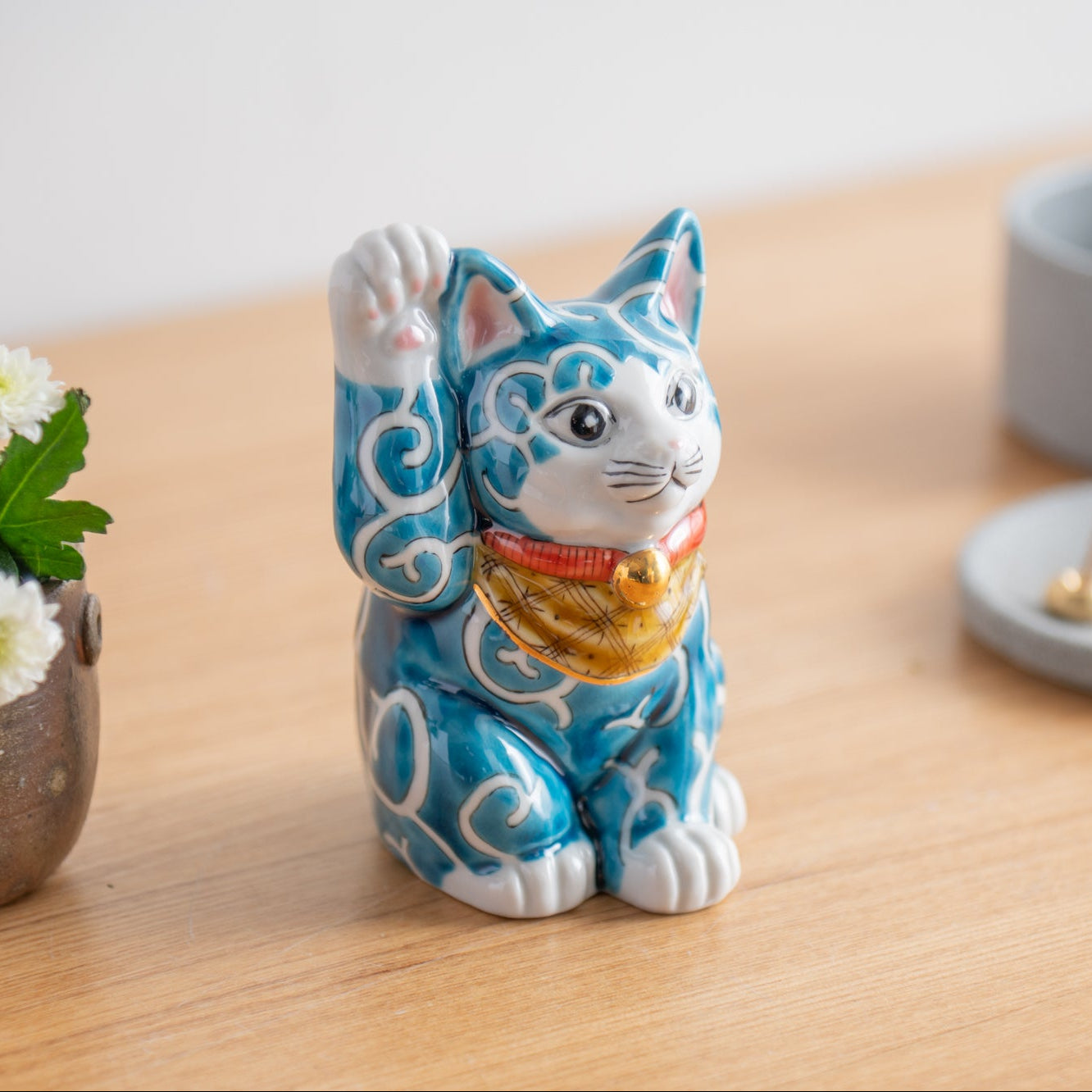 Blau mit Arabesken-Glückskatze