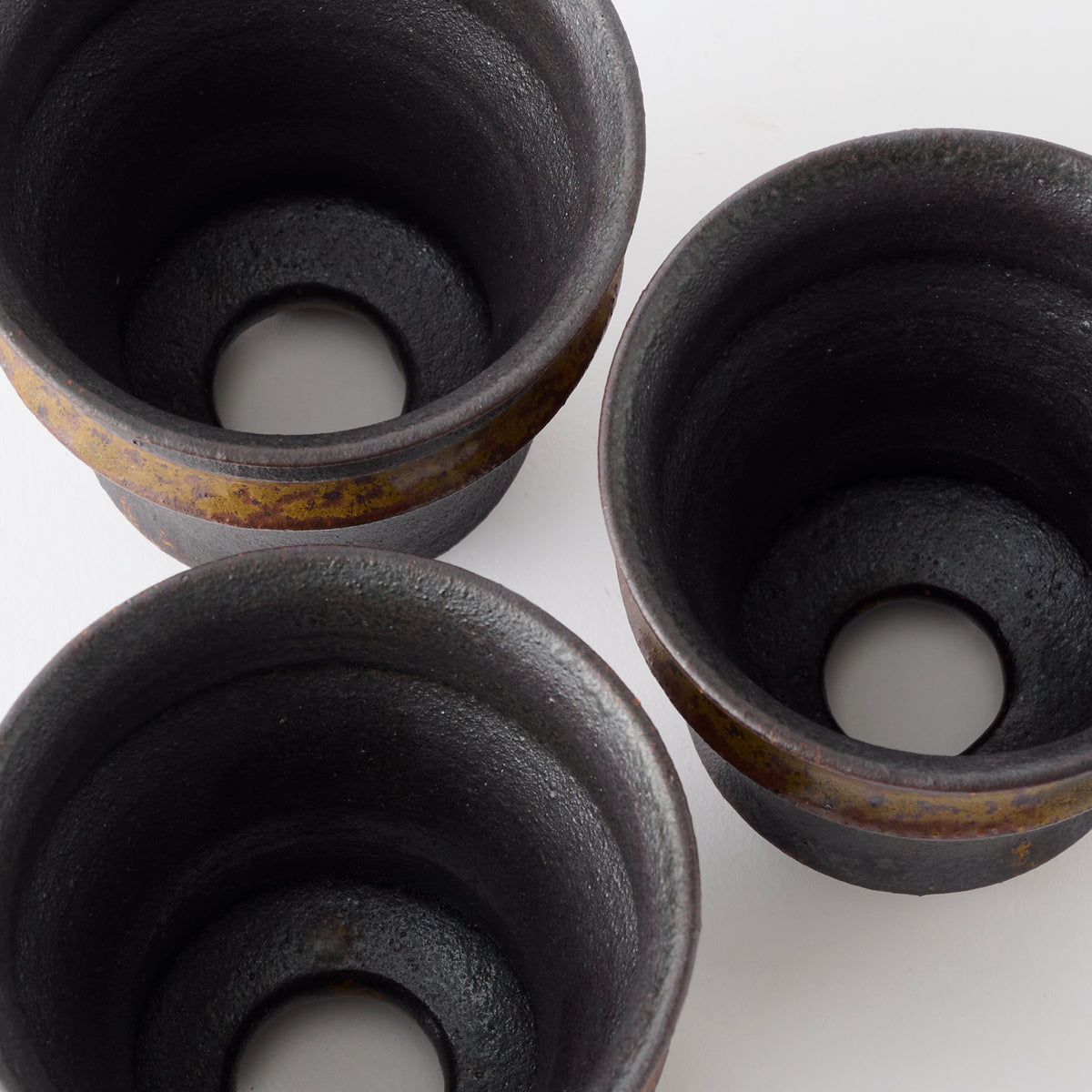 Torch Brown Inlay on Black Plant Pot 3.1 In