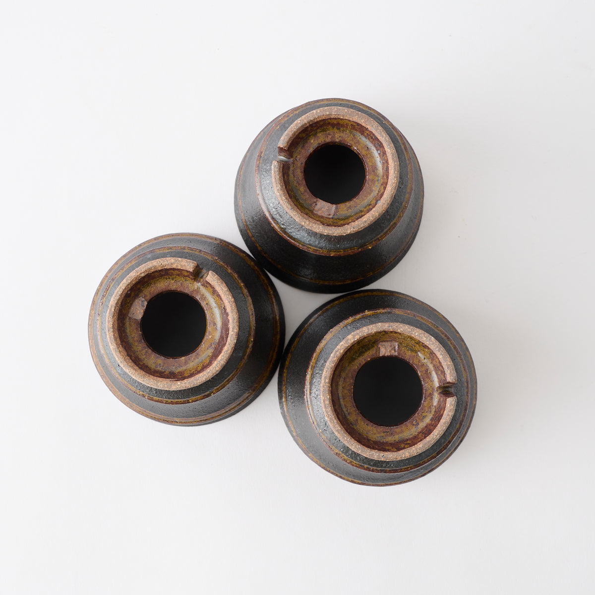 Torch Brown Inlay on Black Plant Pot 3.1 In