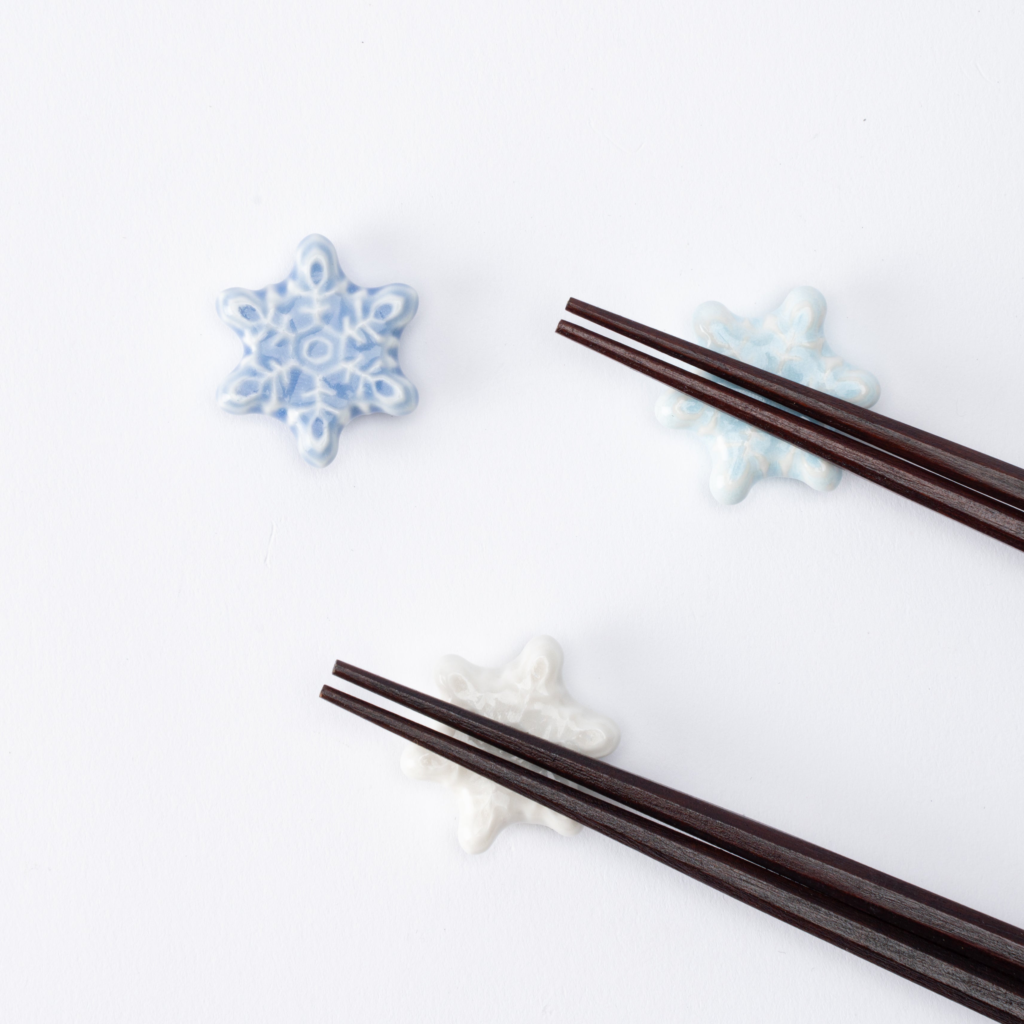 Reposapalillos con forma de copo de nieve en forma de estrella
