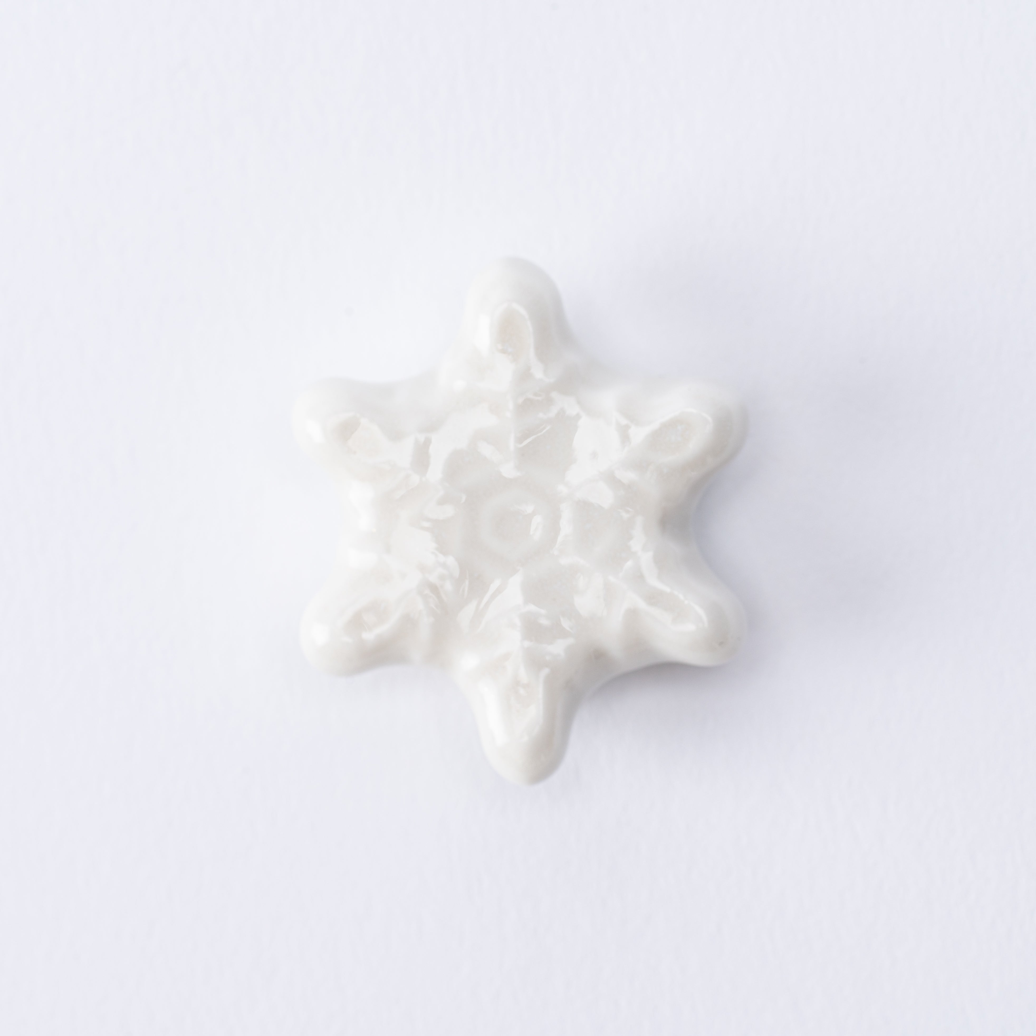 Reposapalillos con forma de copo de nieve en forma de estrella