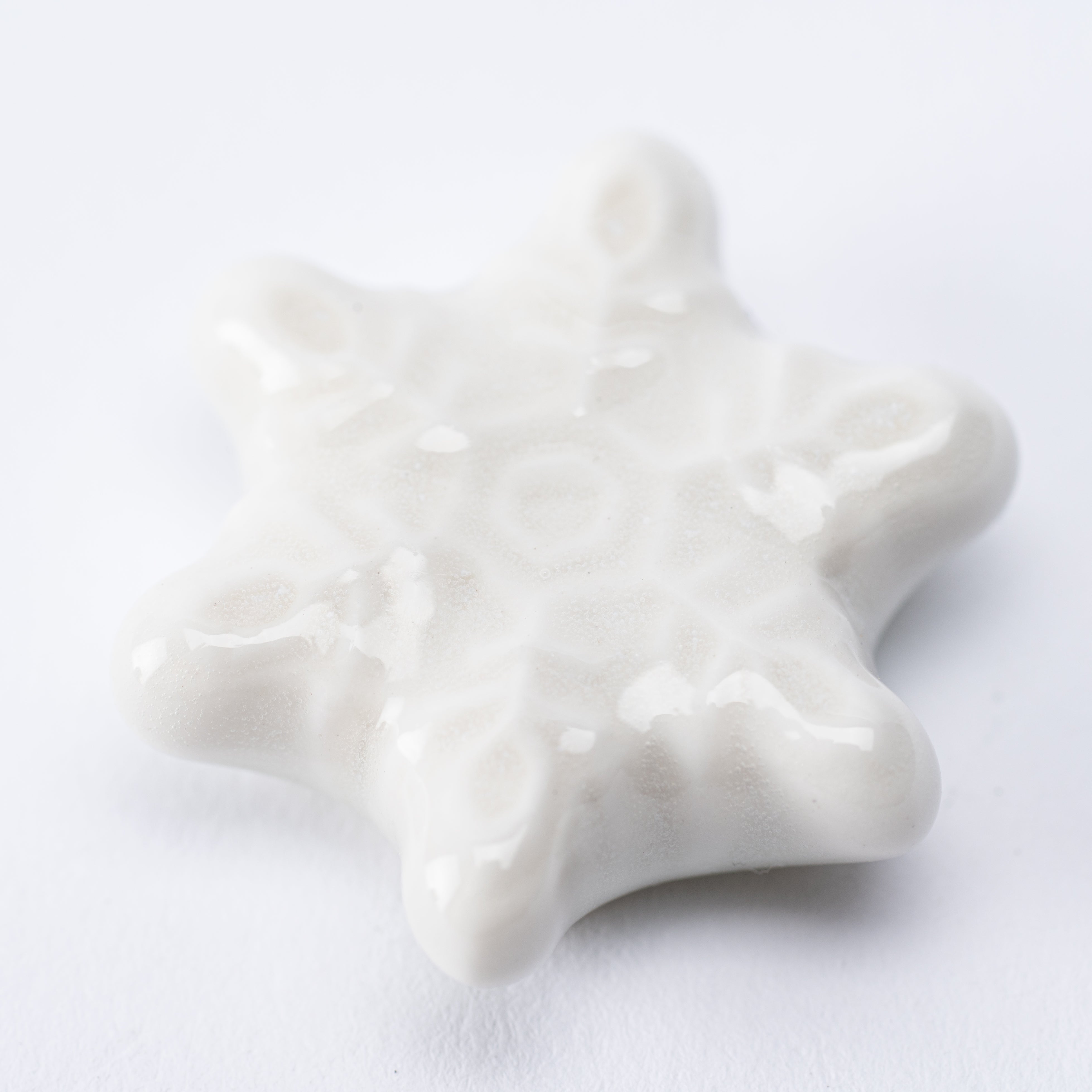 Reposapalillos con forma de copo de nieve en forma de estrella