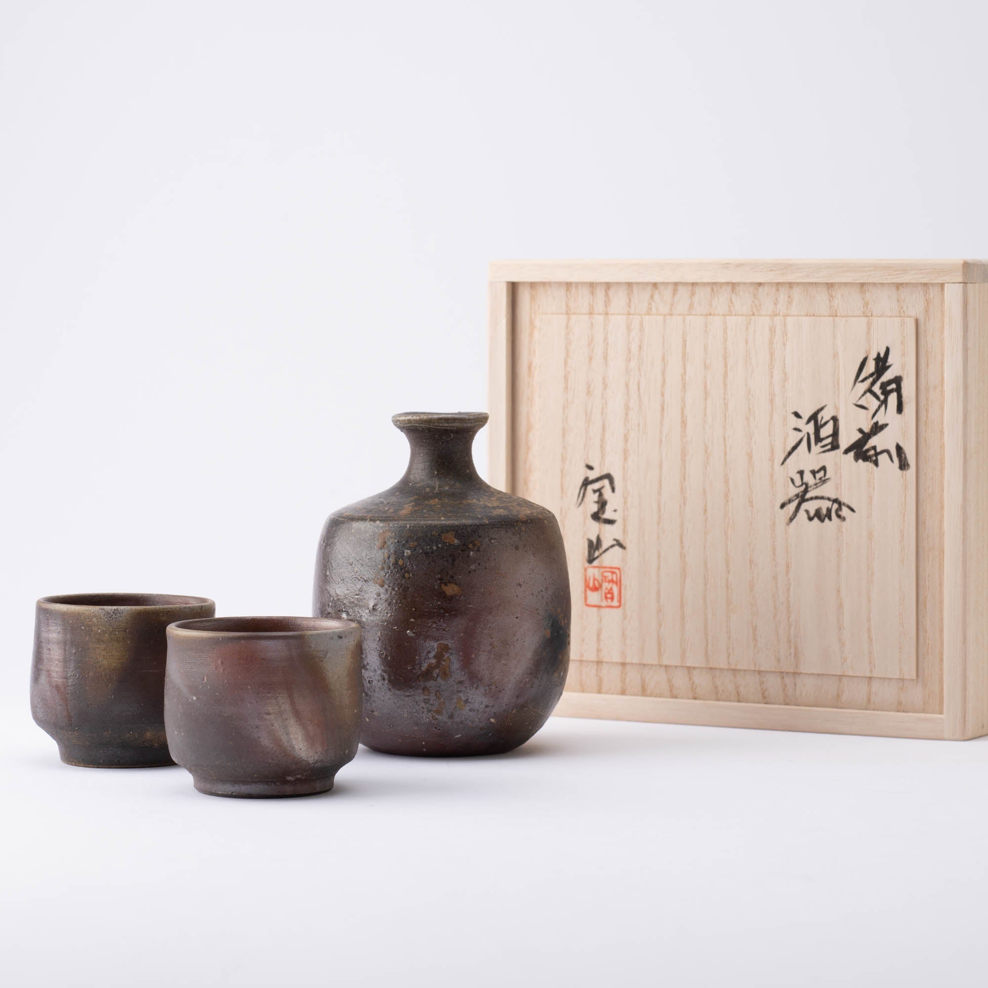 Japanese Glazed Ceramic Sake Set with Oriental Style Blue Ocean Waves Design Includes Serving Carafe and 4 Sake Cups