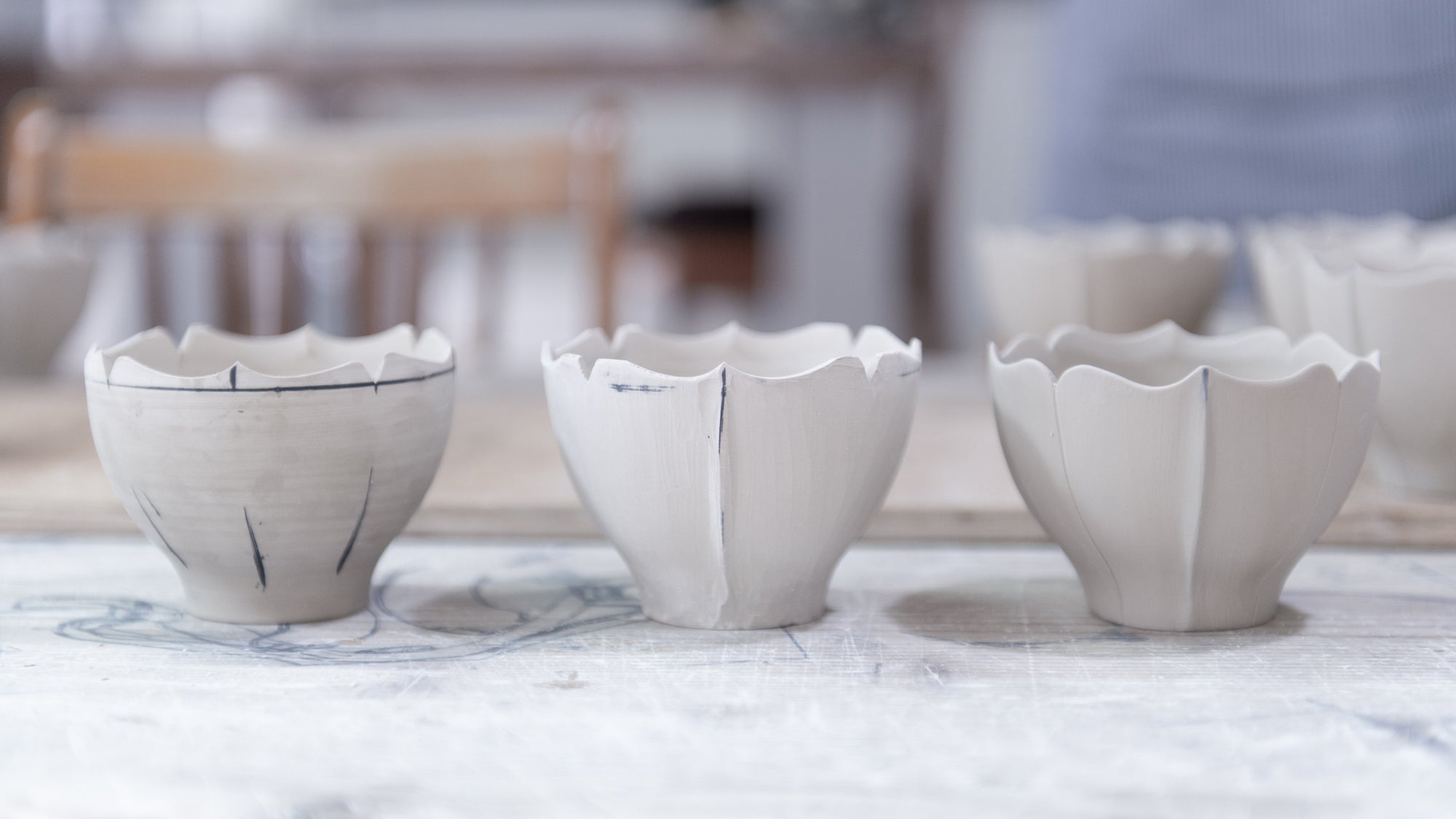 A Symphony of Hands: The Diverse Artisans Behind Usukiyaki's Porcelain Elegance