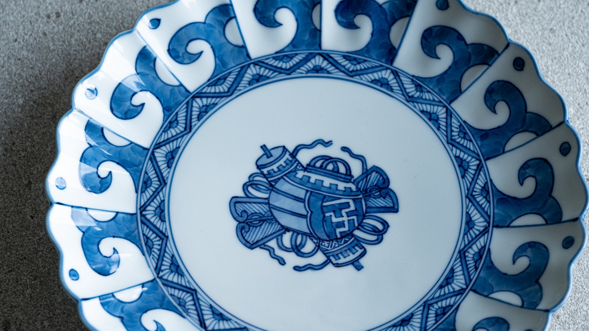 Japanese sometsuke blue-and-white porcelain tableware featuring cobalt gosu designs