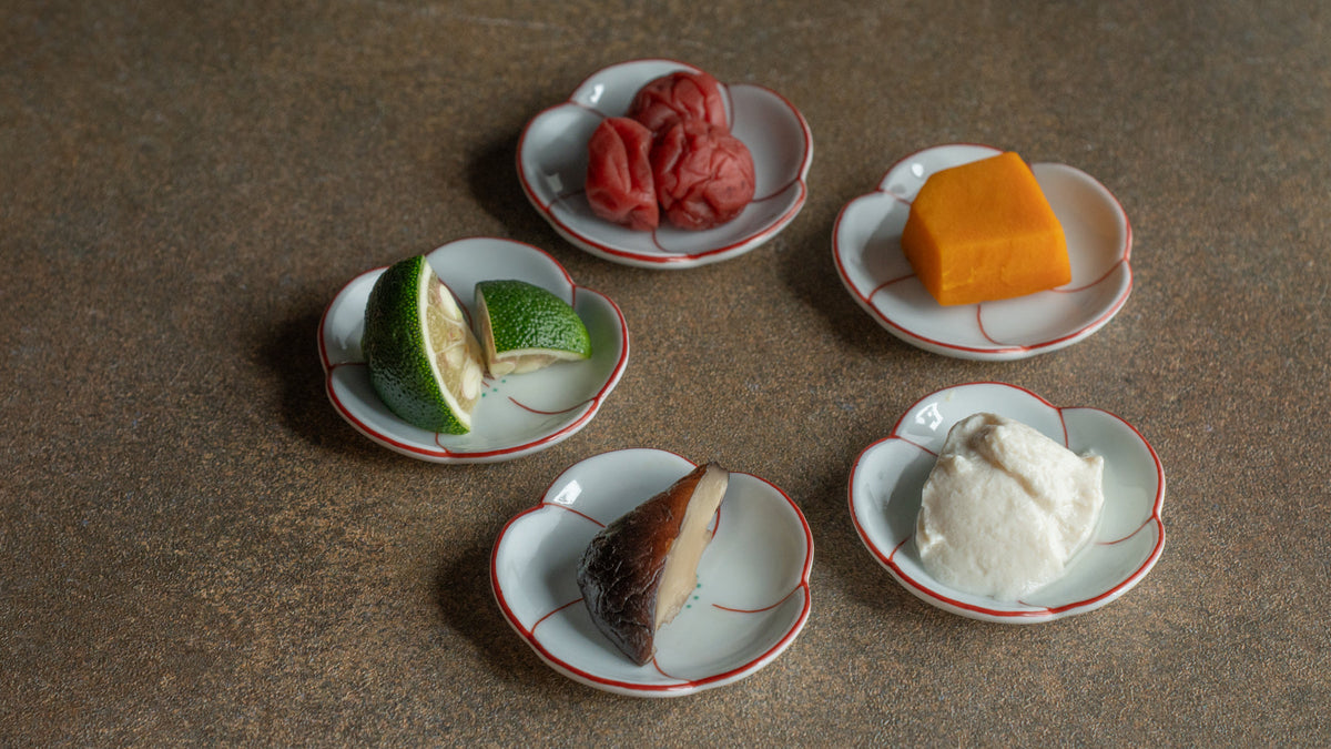 Five Japanese dishes in five colors, each served in its own vessel, reflecting the goshiki (five colors) principle in Japanese cuisine
