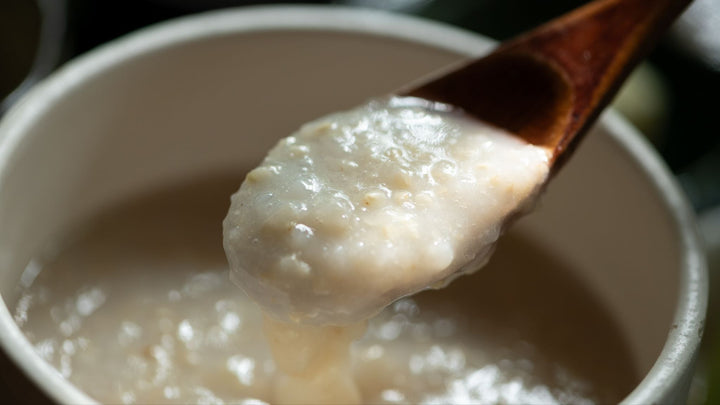 A bowl of okayu (rice porridge) served at Shikizen restaurant inside Togoshi Hachiman Shrine in Tokyo.