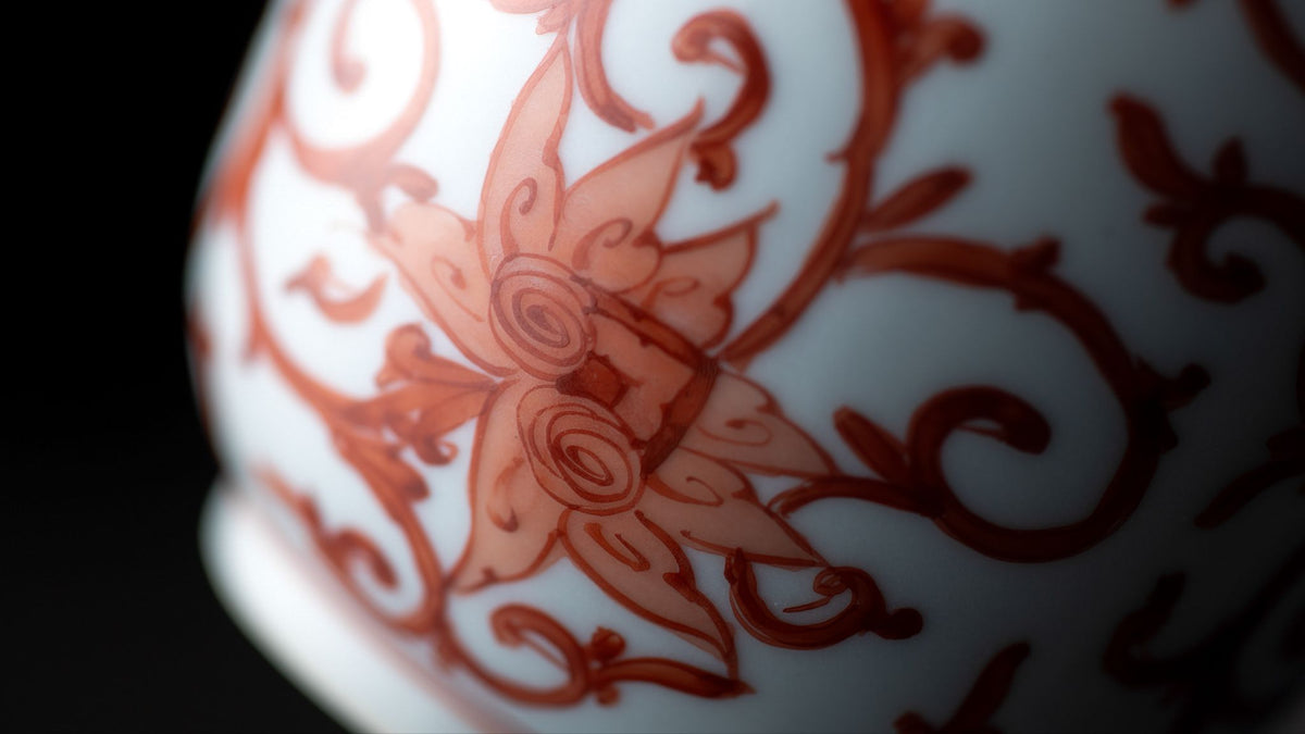 Beautiful red patterns painted on Japanese ceramic vessels