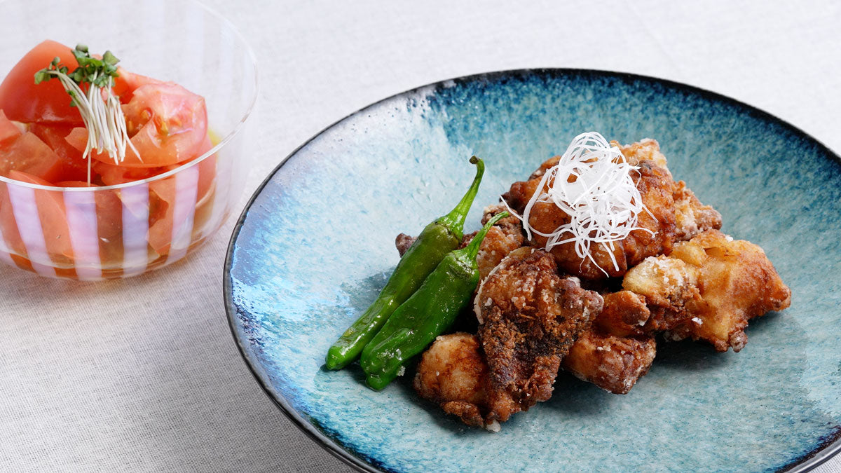 Crispy karaage (Japanese fried chicken) and chilled tomato with wasabi soy dressing