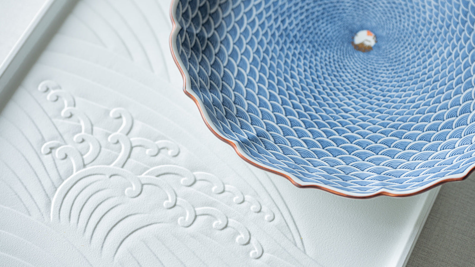 A Japanese plate featuring a traditional pattern inspired by water