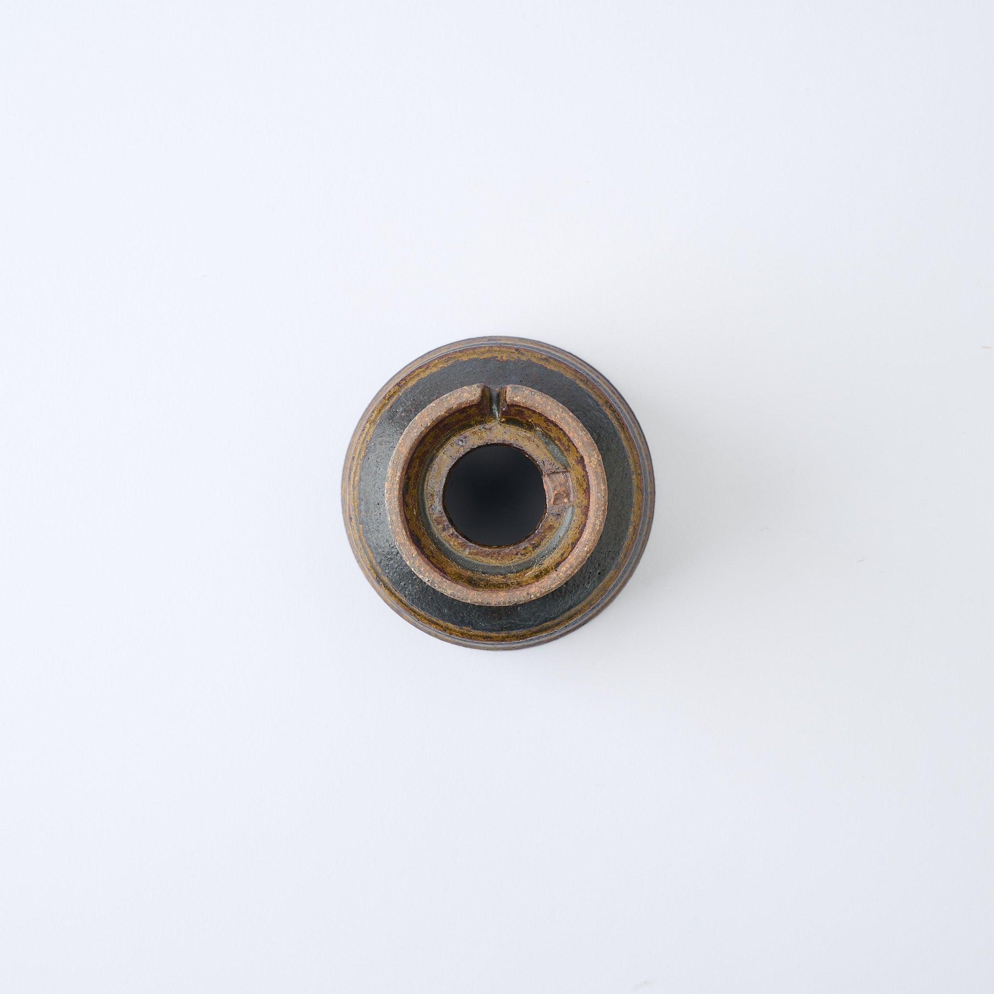 Torch Brown Inlay on Black Plant Pot 3.1 In