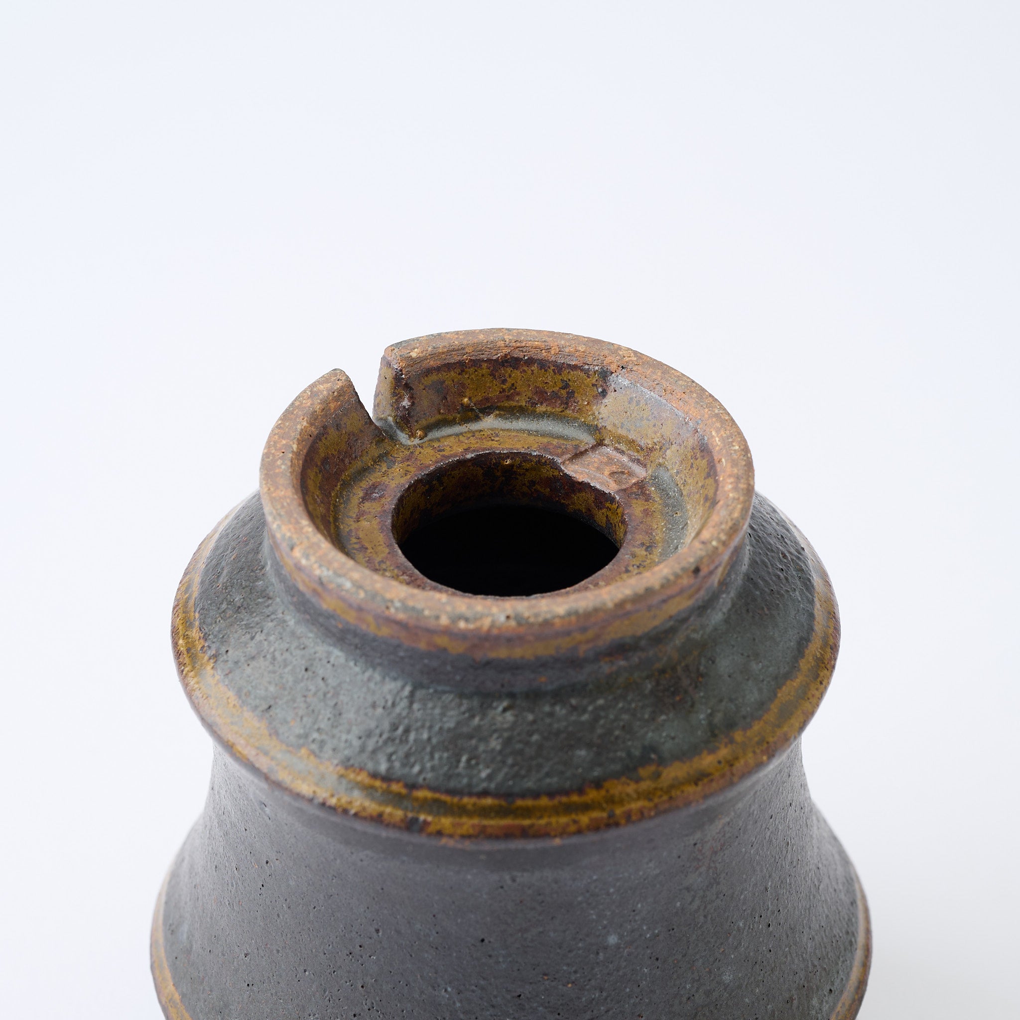 Torch Brown Inlay on Black Plant Pot 3.1 In