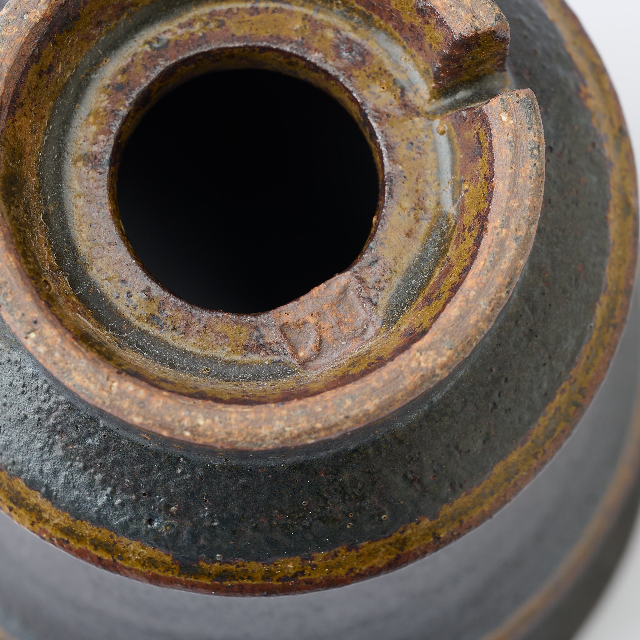 Torch Brown Inlay on Black Plant Pot 3.1 In