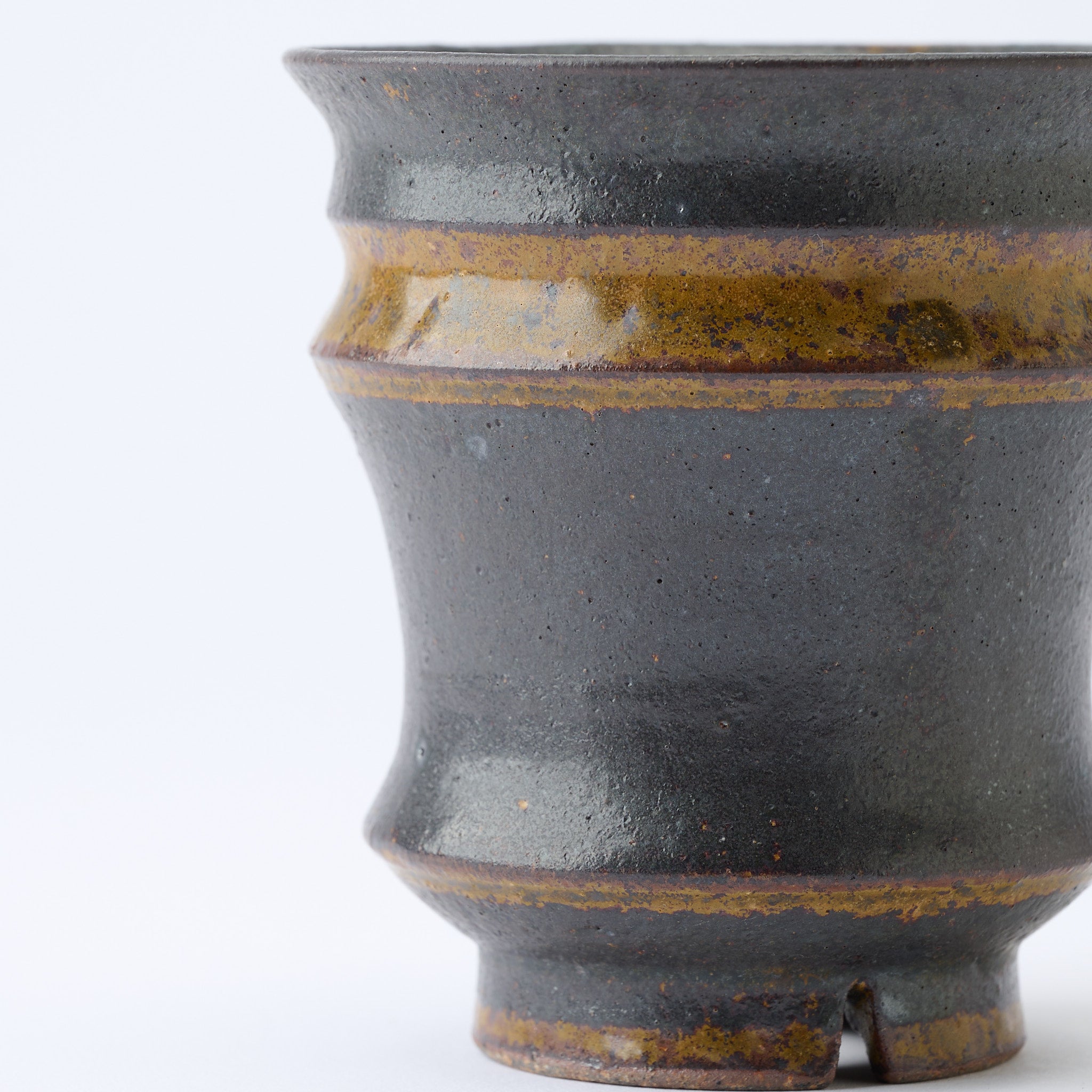 Torch Brown Inlay on Black Plant Pot 3.1 In