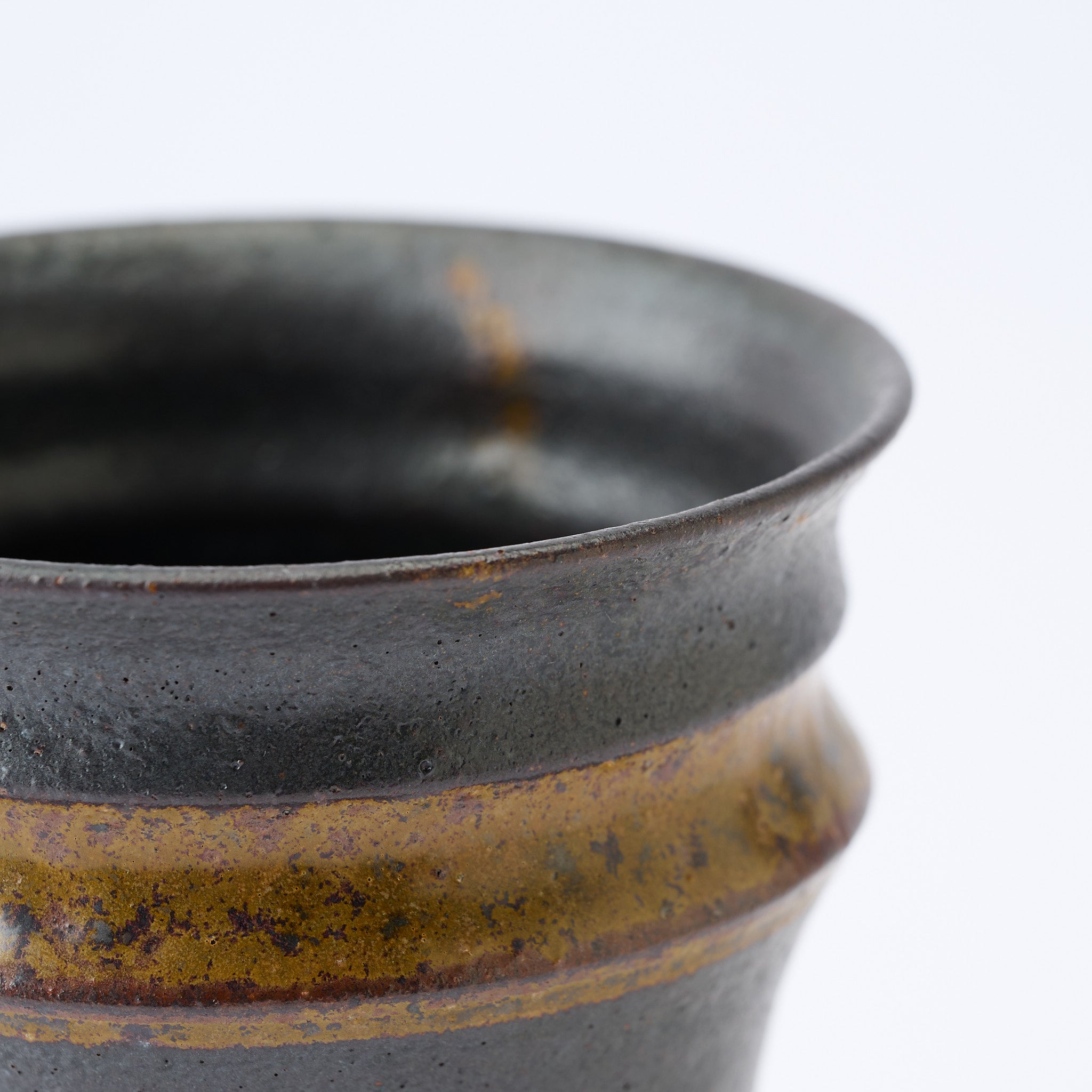 Torch Brown Inlay on Black Plant Pot 3.1 In