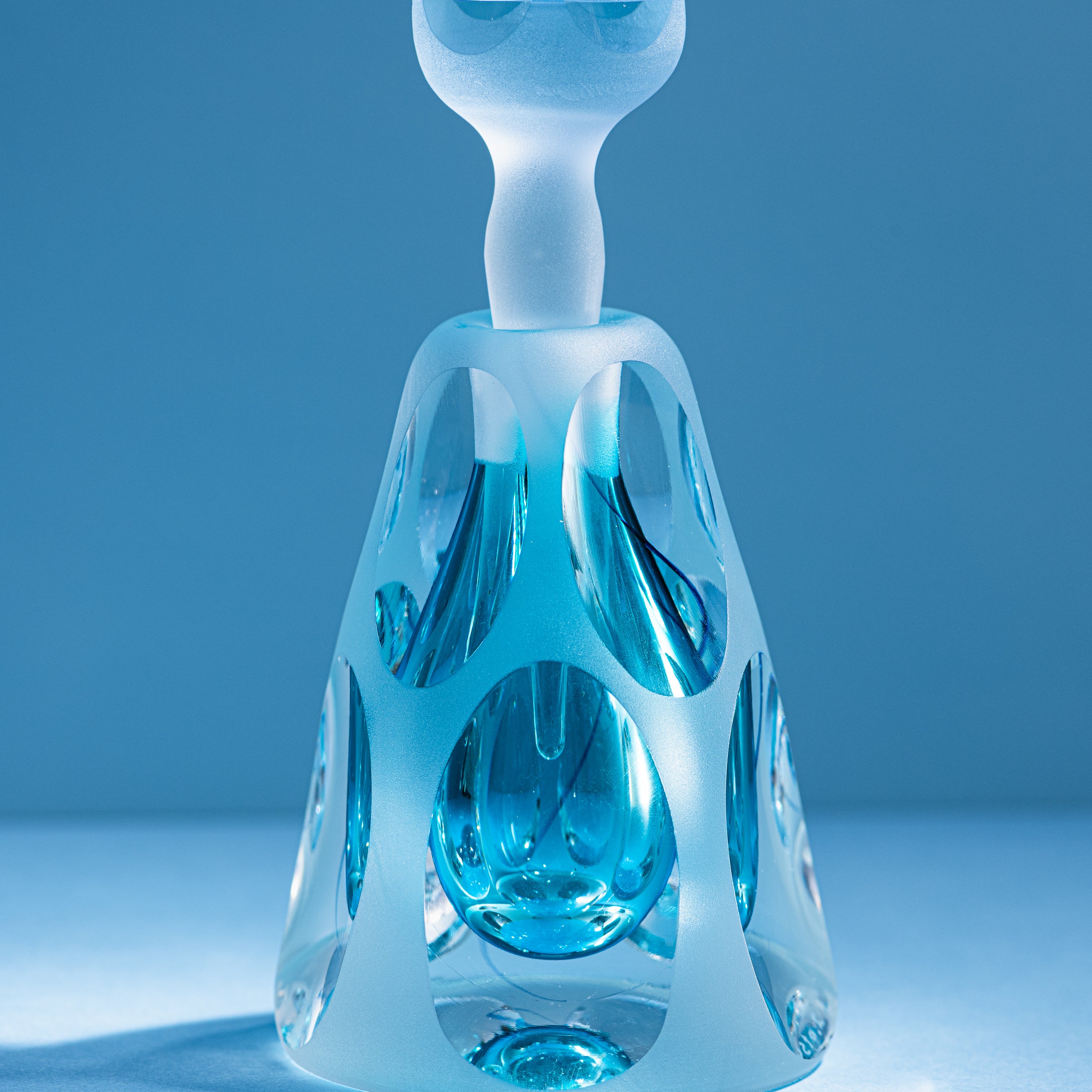 Erinnerungen an die Farben des Himmels Blau Parfümflasche