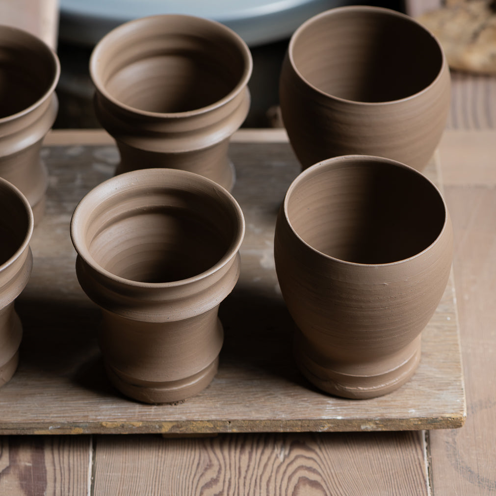 Torch Brown Inlay on Black Plant Pot 3.1 In