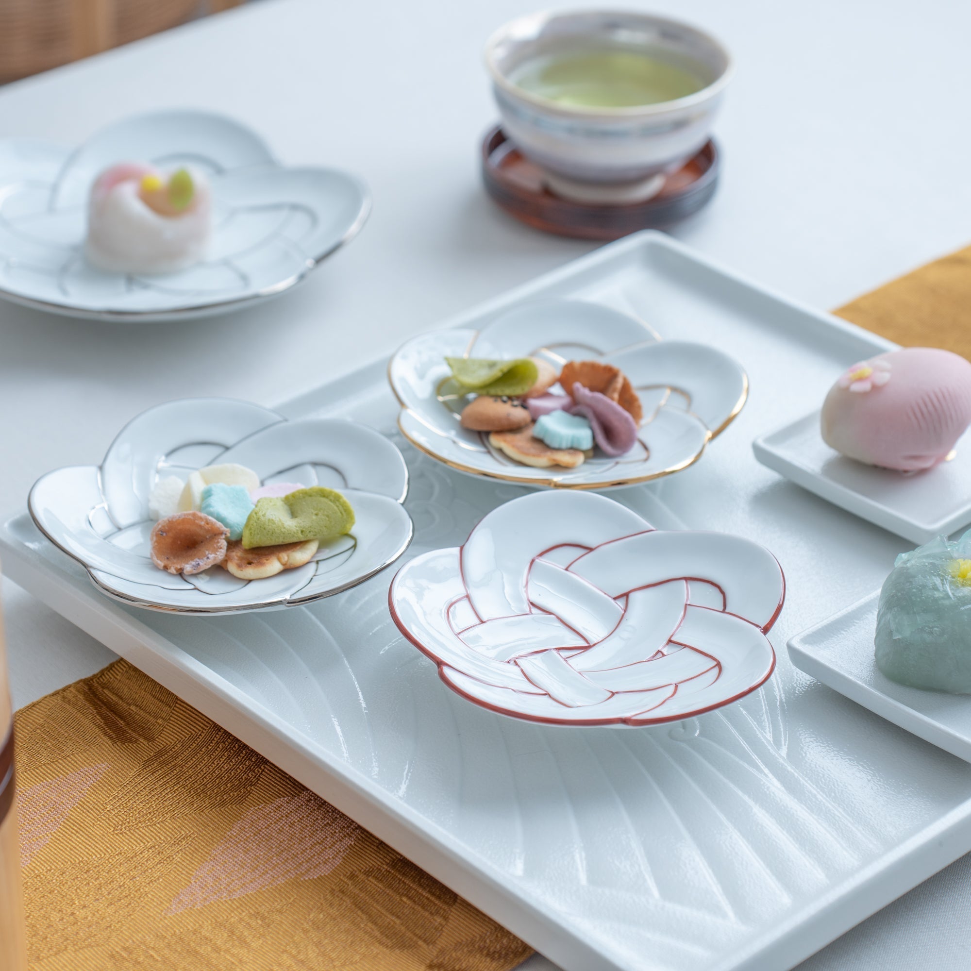 Tasei Kiln Plum Blossom Knot Arita Sauce Plate - MUSUBI KILN - Quality Japanese Tableware and Gift