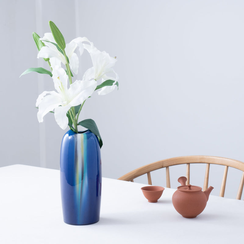 https://musubikiln.com/cdn/shop/products/blue-glaze-kutani-japanese-flower-vase-245cm96in-musubi-kiln-handmade-japanese-tableware-and-japanese-dinnerware-521284_800x.jpg?v=1687180744
