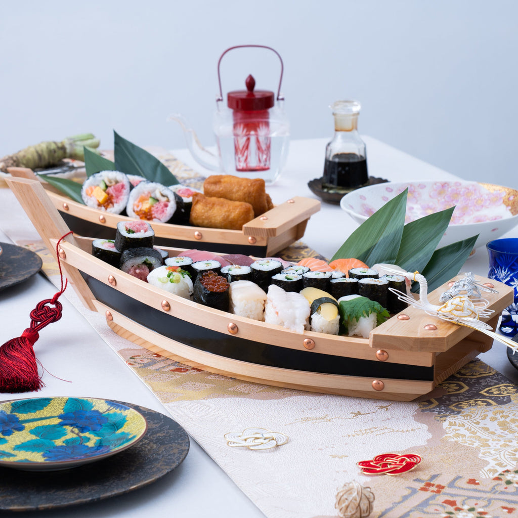https://musubikiln.com/cdn/shop/products/miyabi-urushi-black-belt-kiso-woodwork-sushi-boat-197in-musubi-kiln-handmade-japanese-tableware-and-japanese-dinnerware-936554_1024x.jpg?v=1651084248