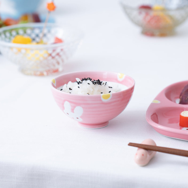 https://musubikiln.com/cdn/shop/products/oshin-kiln-pink-rabbit-hasami-childrens-japanese-rice-bowl-musubi-kiln-quality-japanese-tableware-and-gift-419208_800x.jpg?v=1675815836