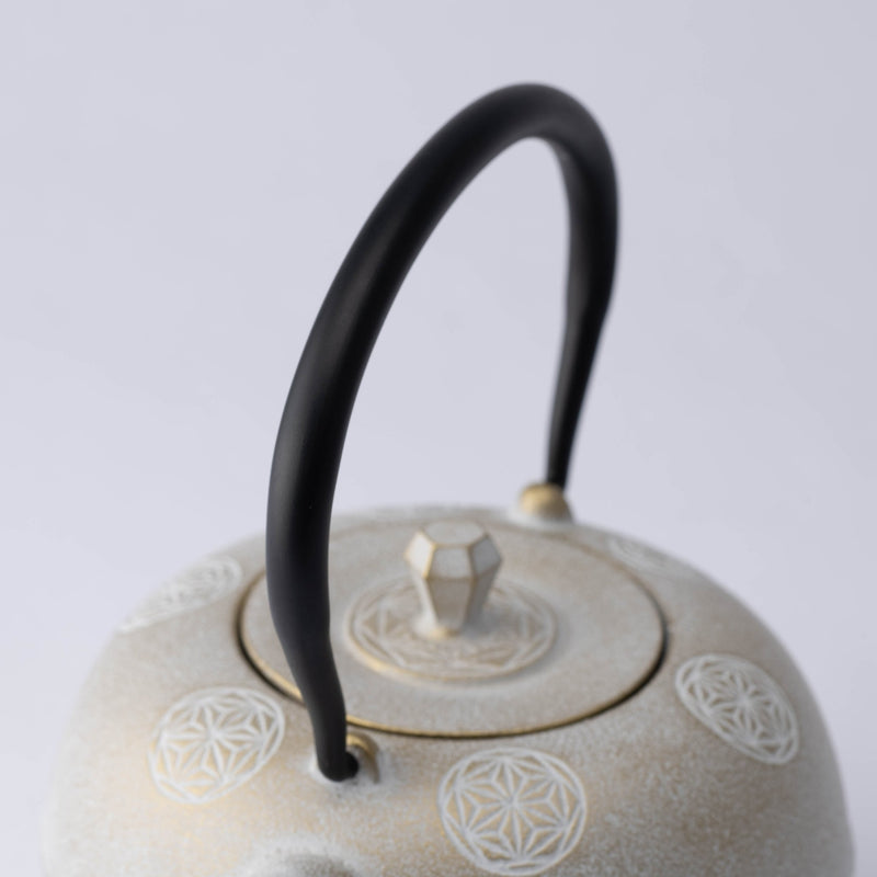 https://musubikiln.com/cdn/shop/products/seven-stars-nambu-ironware-cast-iron-teapot-with-trivet-musubi-kiln-handmade-japanese-tableware-and-japanese-dinnerware-111266_800x.jpg?v=1703557824
